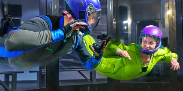 indoor skydiving Skydive Perris an instructor and solo skydiving student fly in the indoor skydiving wind tunnel