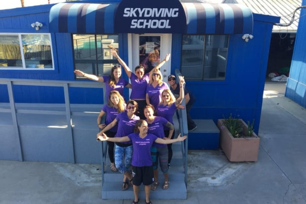 Angie Aragon makes fun poses with women from WSLN