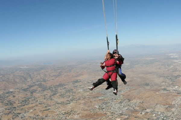 tandem student feels pull of parachute opening