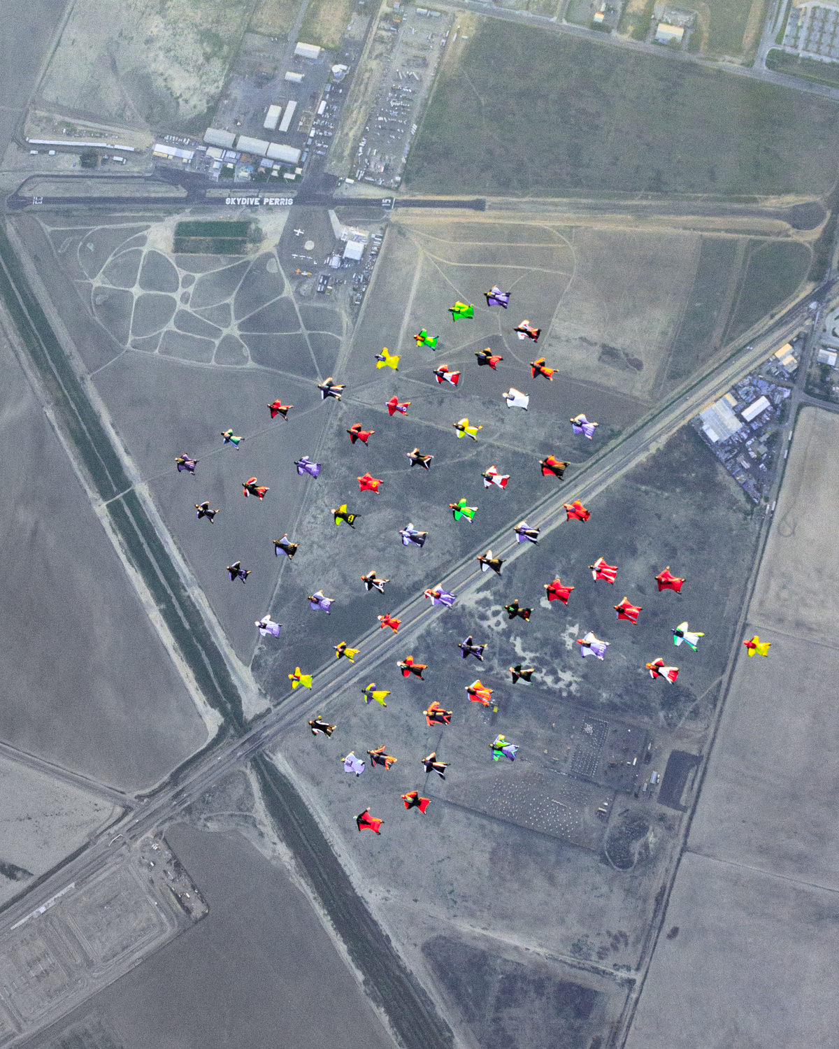 61 person wing suit formation photo taken by dan dupuis