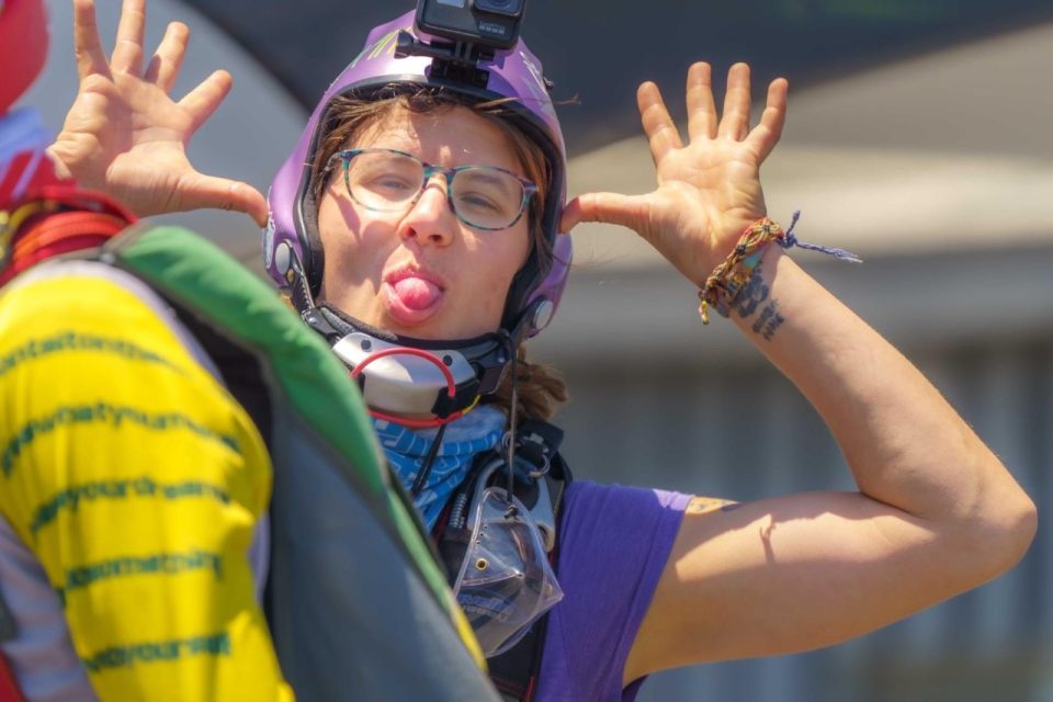 Katie Piele laughs and sticks out her tongue at the camera man.