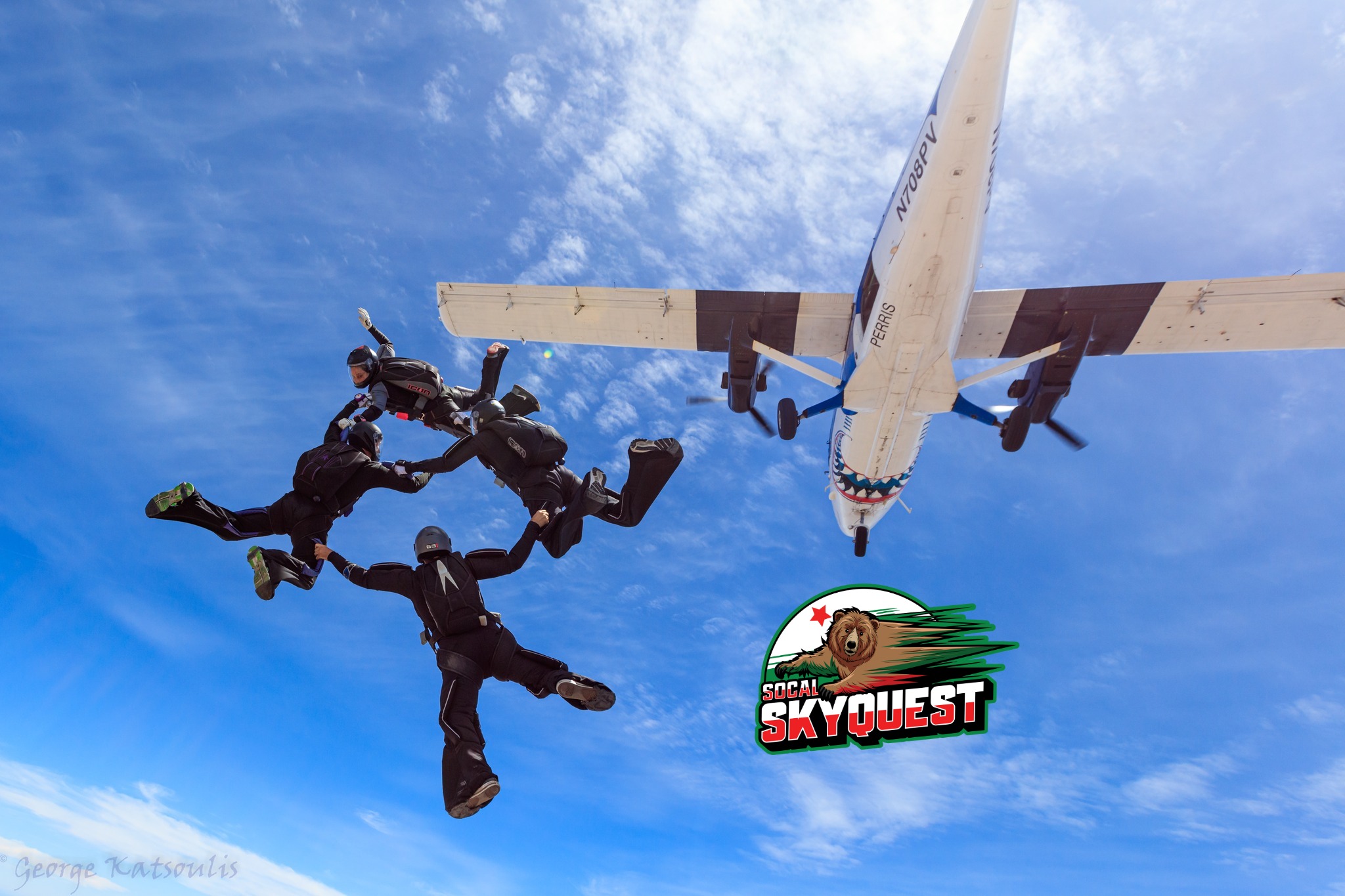 4 way formation skydivers exit airplane at skydive Perris near skydiving in San Diego